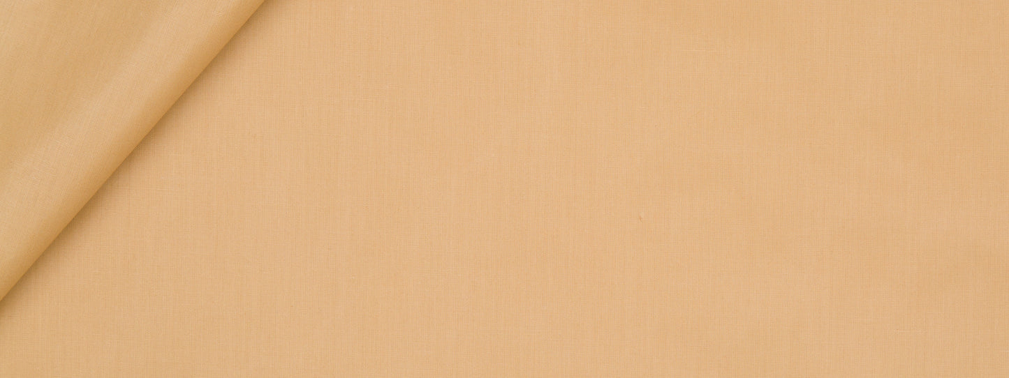 Beige fabric with a soft top-left fold, smooth texture, warm neutral tone.