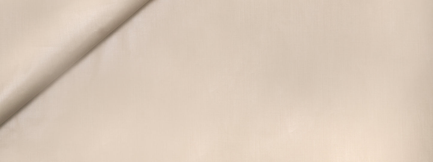 Light beige fabric with a gentle diagonal fold, soft drape suitable for dressmaking or home textiles.