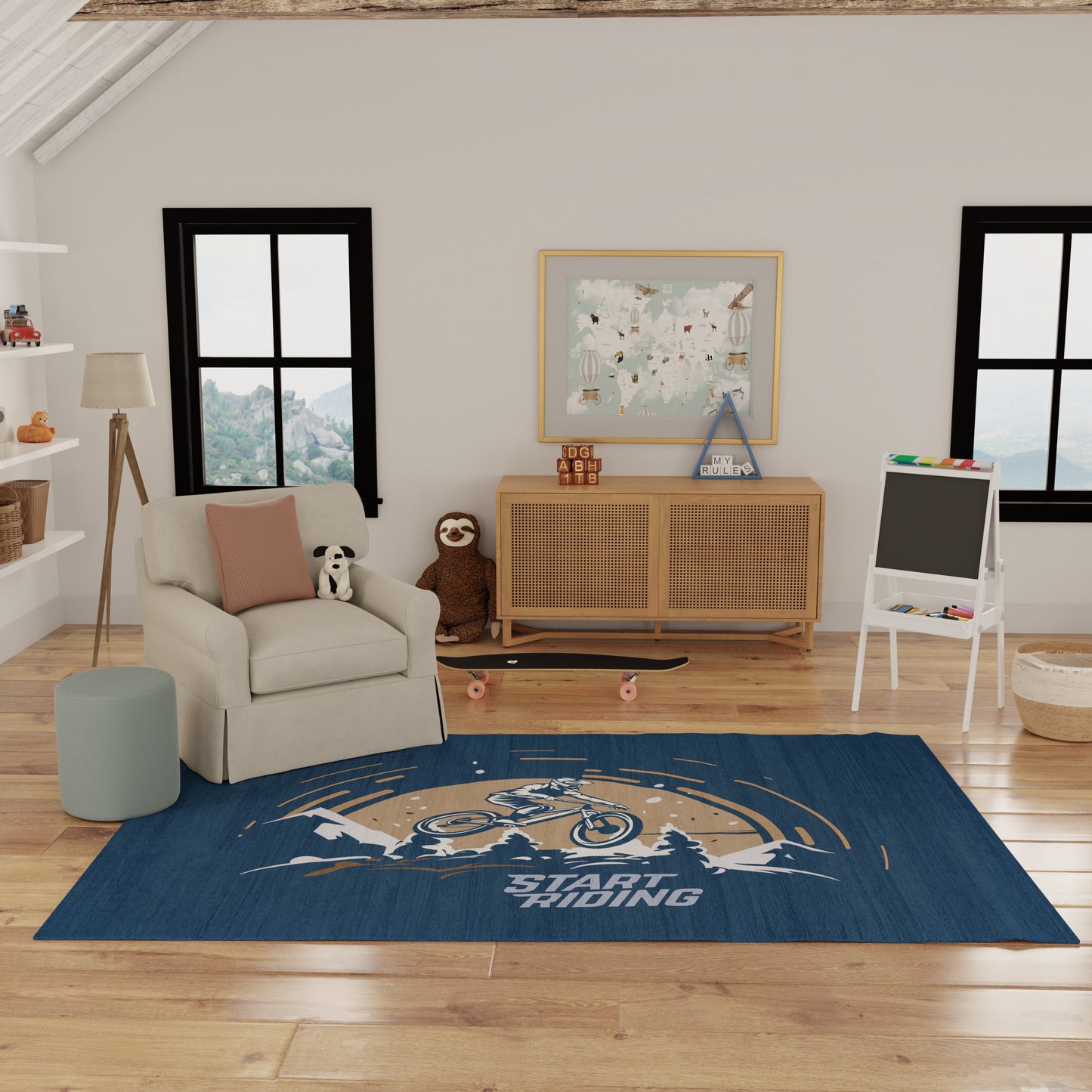Blue rectangular kids' rug with beige bicycle motif and Start Riding text, ideal for a playroom.
