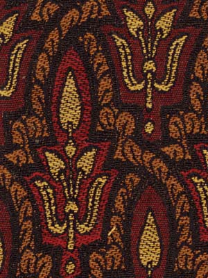 Close-up of charcoal damask brocade upholstery fabric with gold & brown floral scroll motifs.