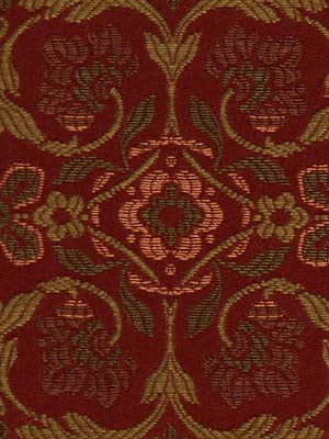 Red and gold damask brocade upholstery fabric with ornate floral scrolls and a central medallion.