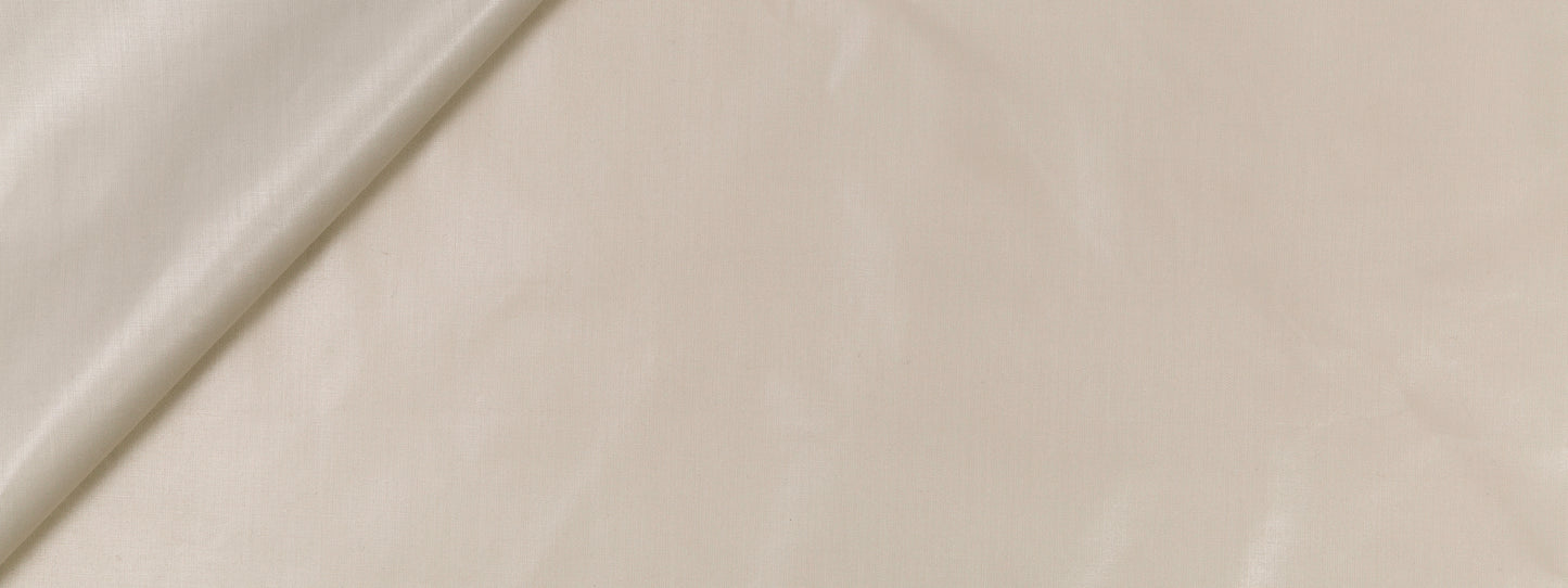 Beige linen fabric with subtle texture and a folded edge, soft and lightweight drape.
