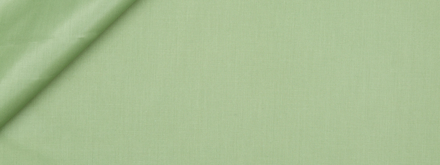 Mint-green fabric with a diagonal fold; smooth matte weave and versatile textile for garments or decor.