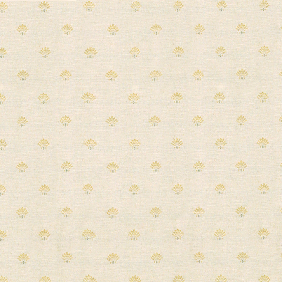 Champagne background with tiny gold-yellow scallop shell motifs in a delicate repeating pattern; vintage-inspired upholstery fabric.