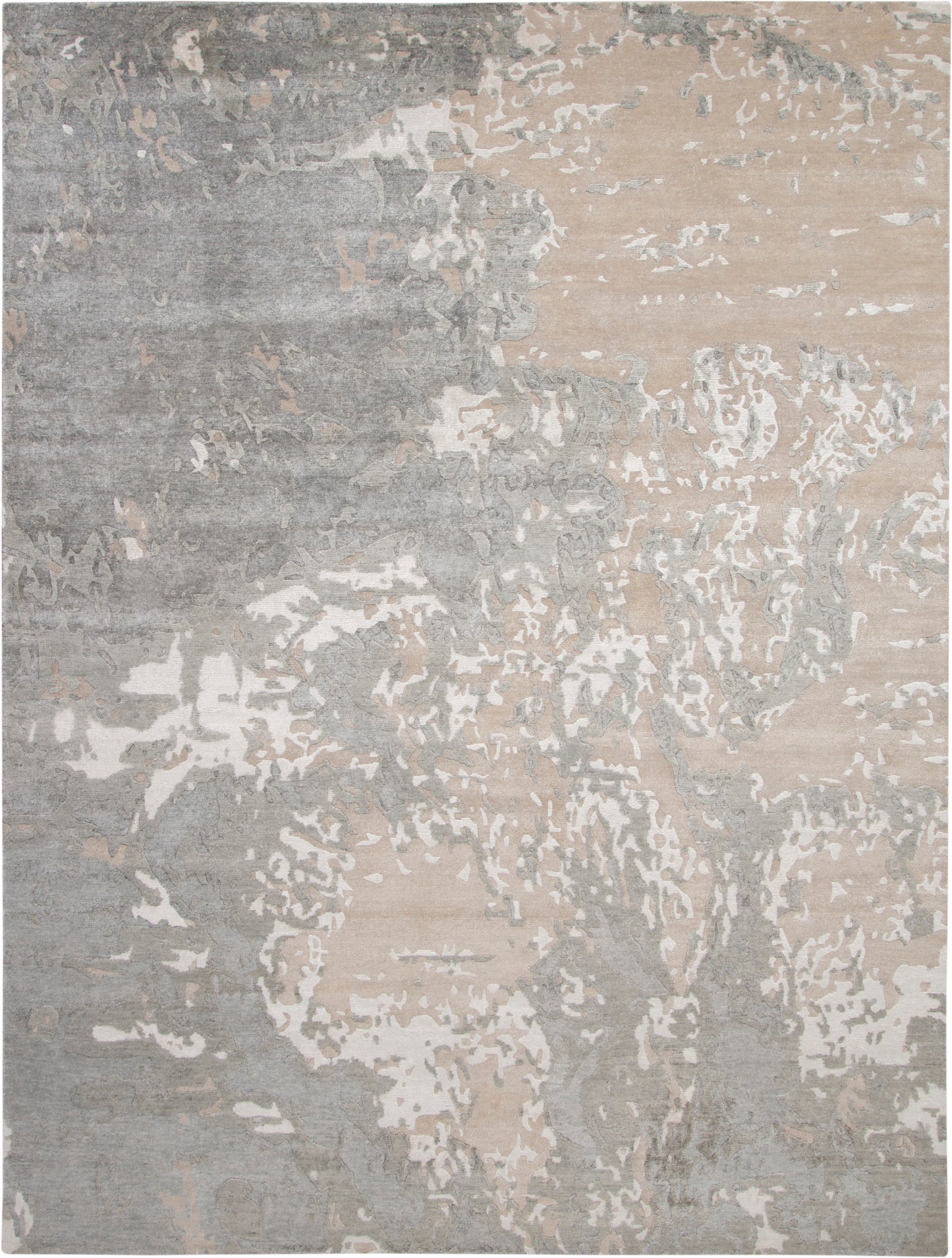 Abstract distressed area rug in gray, beige and ivory; rectangular, muted modern pattern.