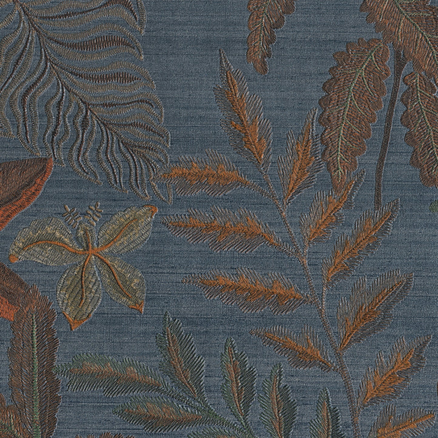Blue wallpaper with fern and leaf motifs in rust, olive, and teal.