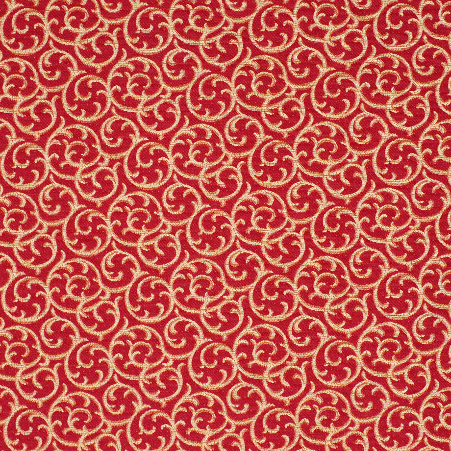 Red fabric with gold-beige scrolling circular damask pattern repeating across.