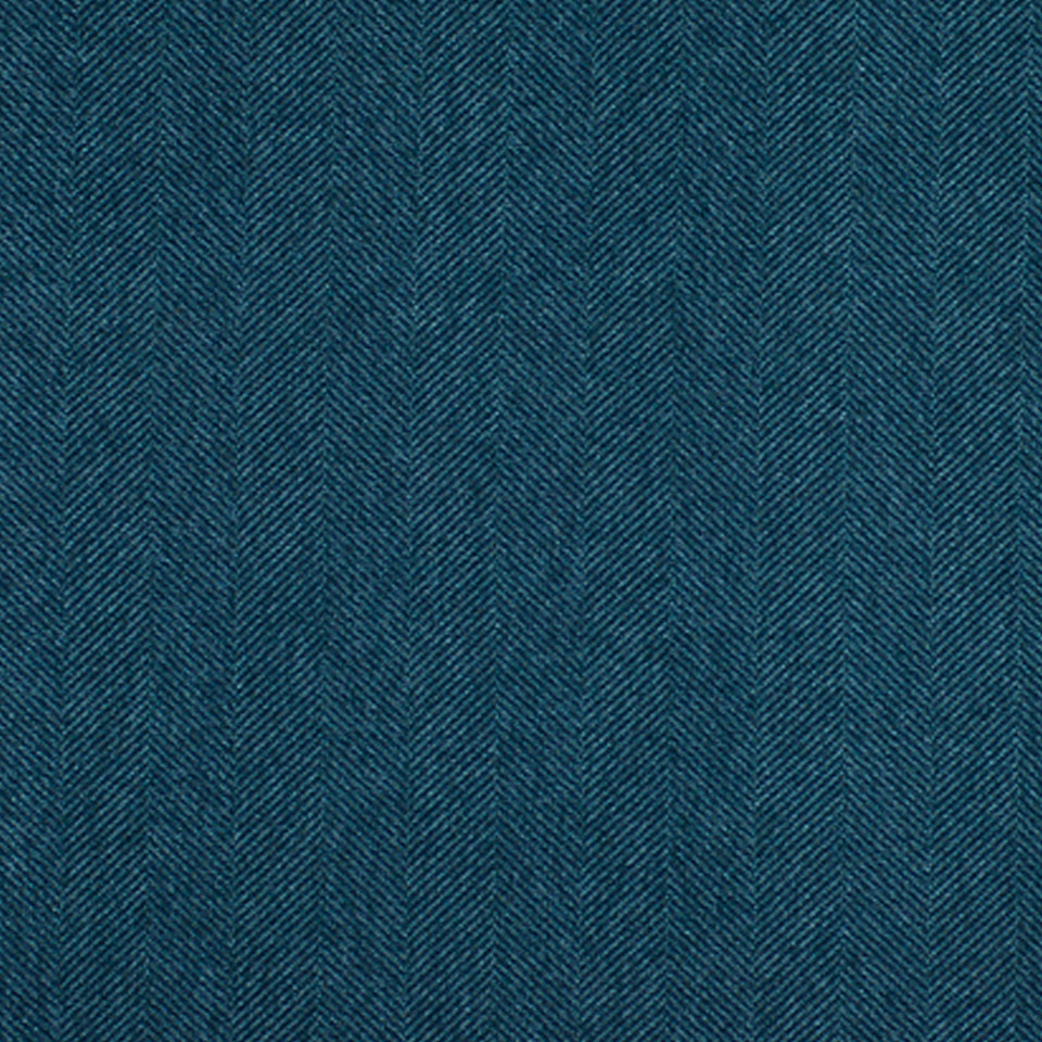 Blue denim twill upholstery fabric close-up with diagonal herringbone weave and rich texture.