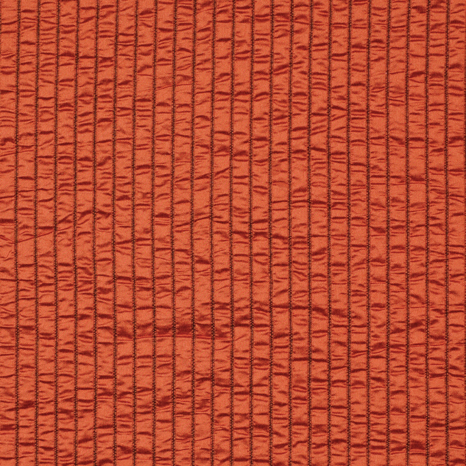 Orange Henna corduroy upholstery fabric with narrow vertical ridges.