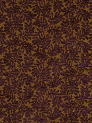 Brown and gold damask jacquard upholstery fabric with ornate leafy motif.