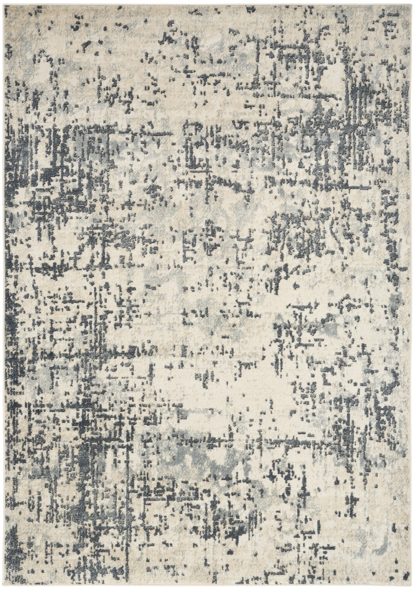 Abstract distressed beige and blue-gray area rug with a modern, worn look.