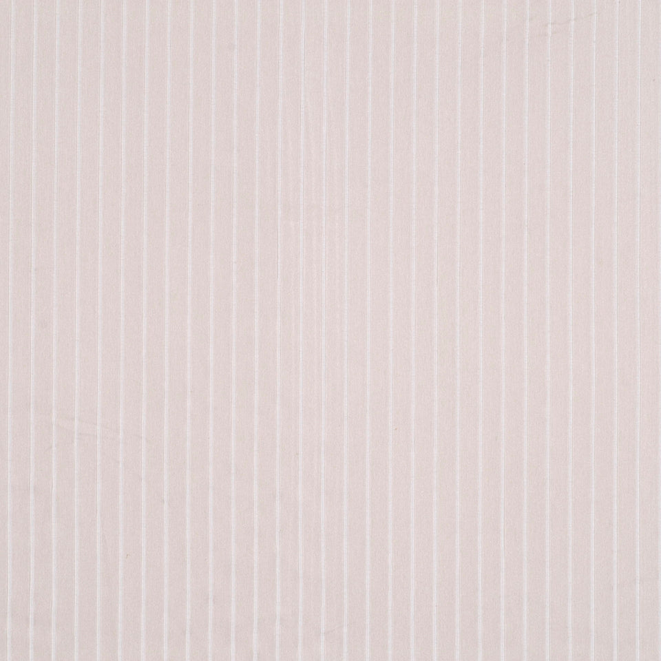 Soft pink upholstery fabric with narrow white vertical pinstripes.