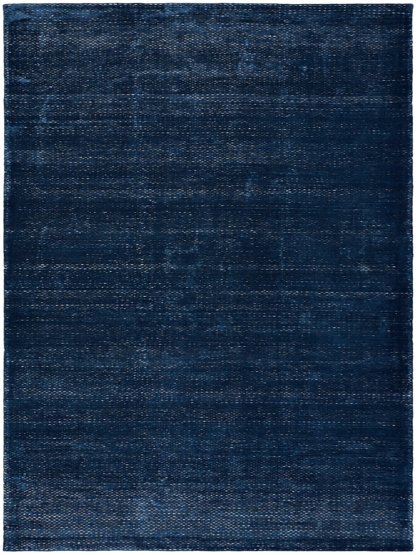 Navy blue rectangular area rug with a subtle distressed woven texture.