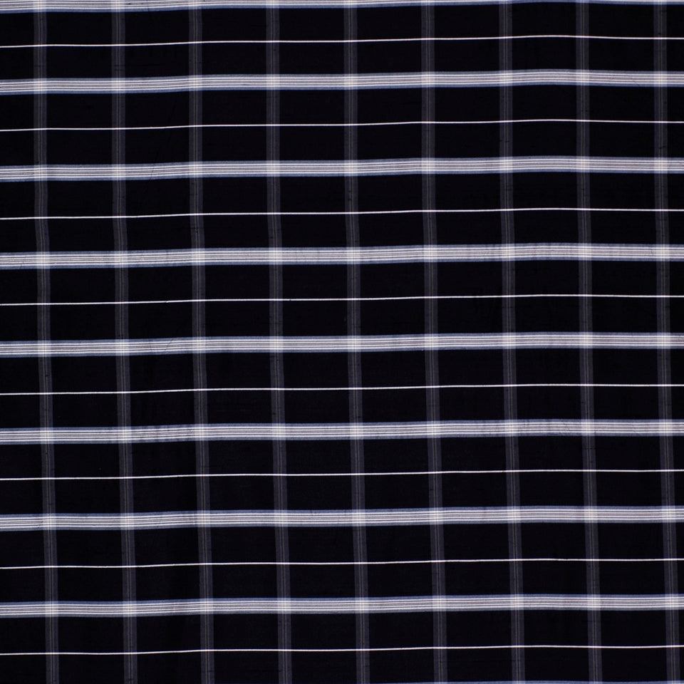 Black fabric with white grid lines forming a small square gingham check pattern; lightweight cotton-like material.