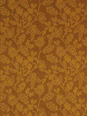 Amber-brown drapery fabric with a gold floral damask pattern.