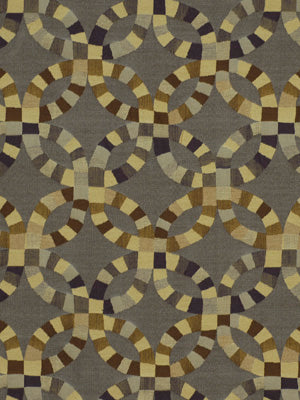 Geometric circle-link pattern on upholstery fabric in beige, tan, brown and gray with an olive background.