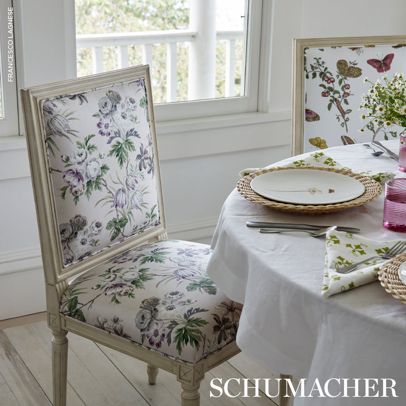 Cream background with lavender wisteria chintz print.