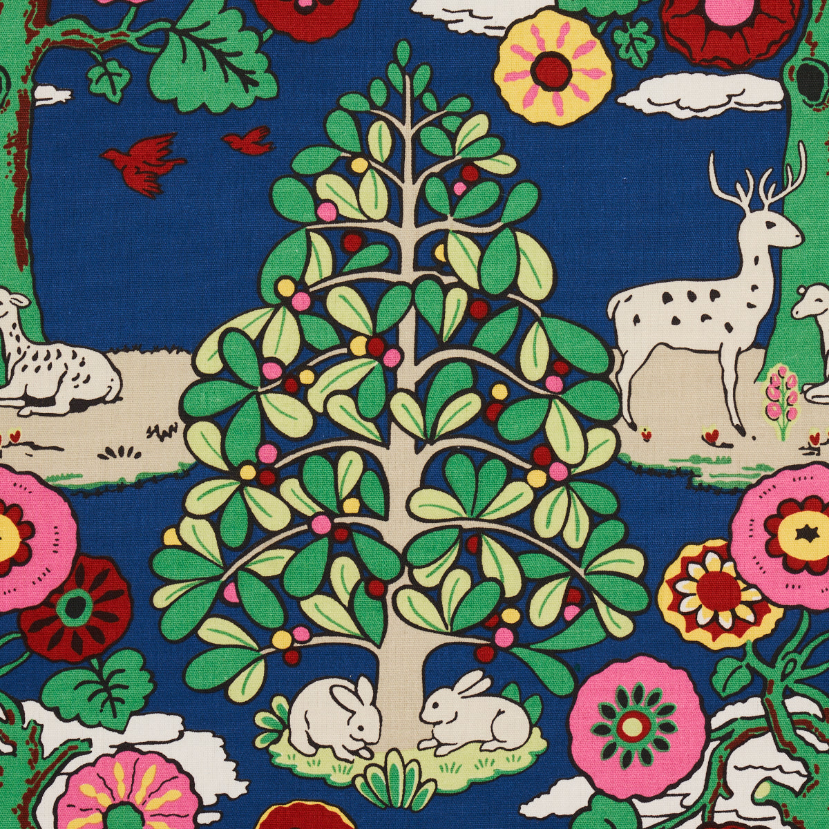 Whimsical woodland fantasy forest print on blue background with green-leaved trees, rabbits, deer and blooming flowers.