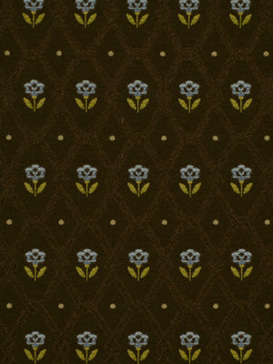 Dark brown fabric with a repeating vintage floral pattern: blue-gray flowers on yellow-green stems, with tiny dot accents.