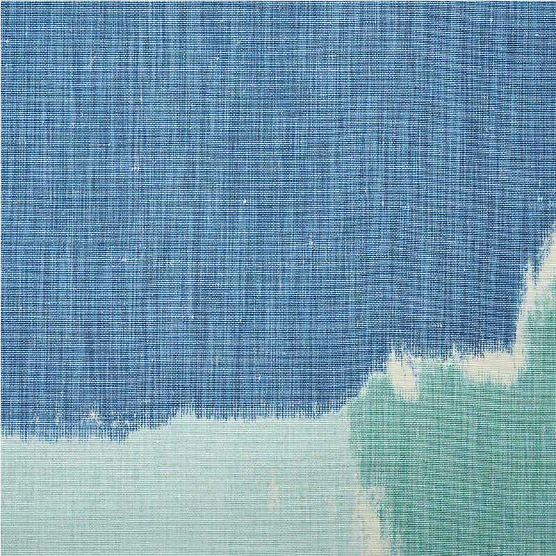 Blue denim-style fabric swatch with a pale mint green bottom edge; abstract woven texture