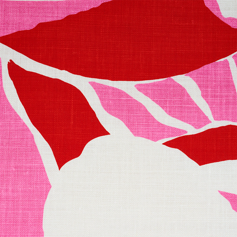 Abstract pink floral textile pattern with bold red petal shapes and white veins; linen-like weave.