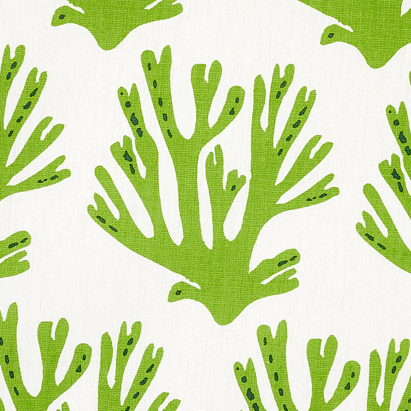 Bright lime green coral-branch pattern repeats on light fabric; tropical botanical textile design.
