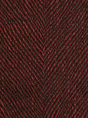 Red and black herringbone tweed fabric close-up with chevron weave texture.
