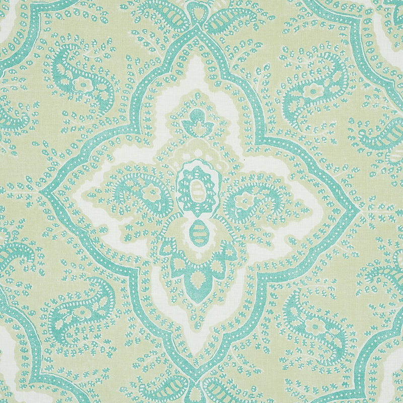 Turquoise aqua arabesque medallion pattern with central diamond motif on cream background.