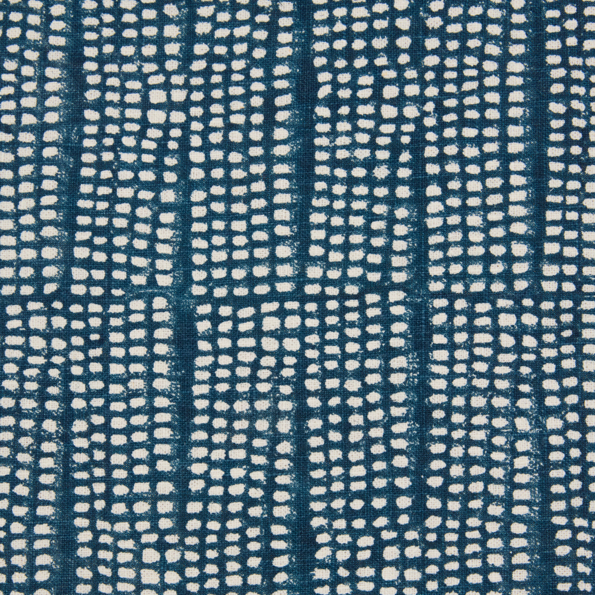 Navy blue fabric with cream irregular dot grid pattern; modern geometric textile suitable for rug or upholstery.
