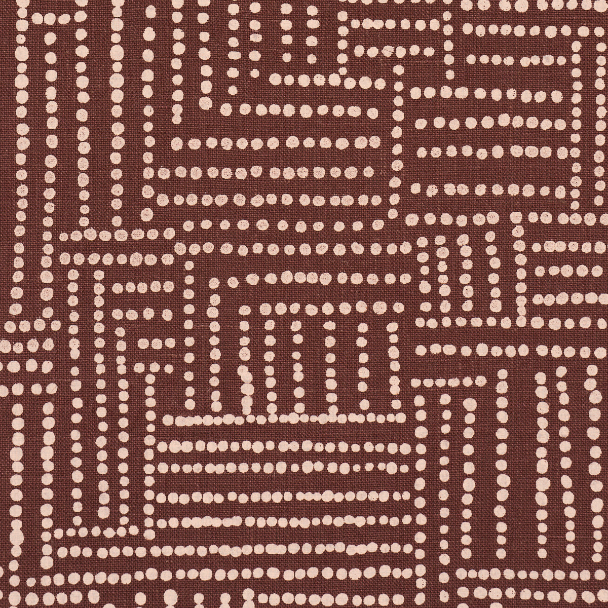 Brown fabric with cream dotted lines forming an interlocking rectangular grid; geometric textile for rug or upholstery.