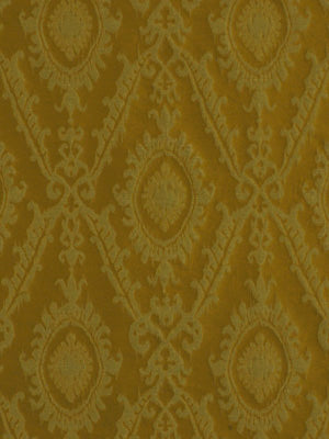 Gold damask-patterned drapery fabric with ornate medallion motifs and scrolling vines.