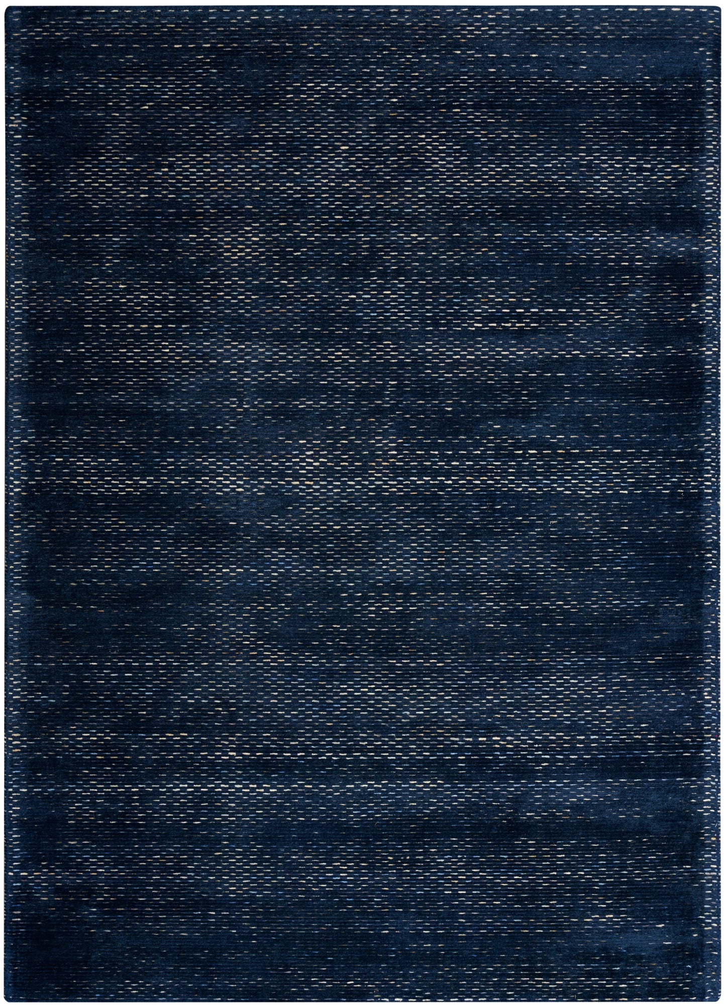 Rectangular dark indigo woven rug with denim-like texture and subtle lighter streaks for casual modern decor.
