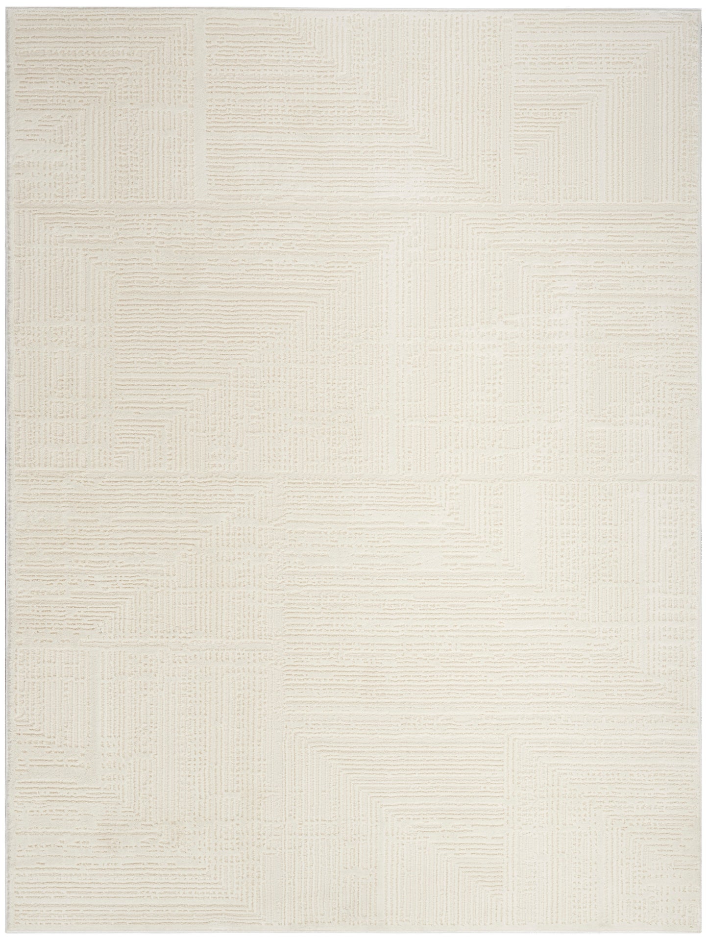 Cream rectangular area rug with geometric patchwork of raised linear textures; modern, neutral decor.