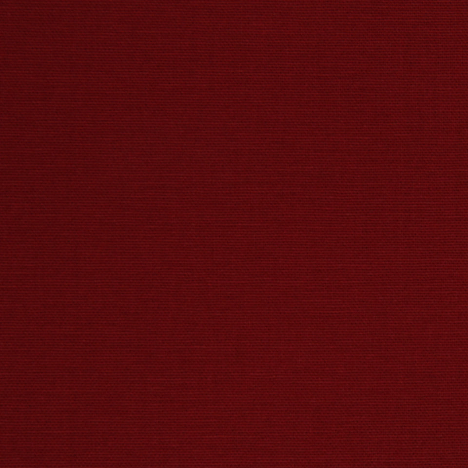 Deep maroon fabric texture with subtle weave.
