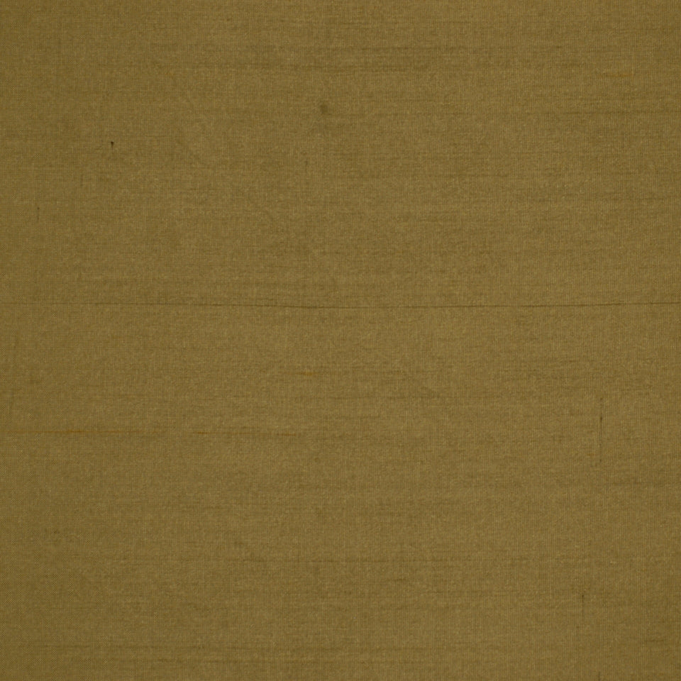 Plain brown surface with subtle texture and seam lines.