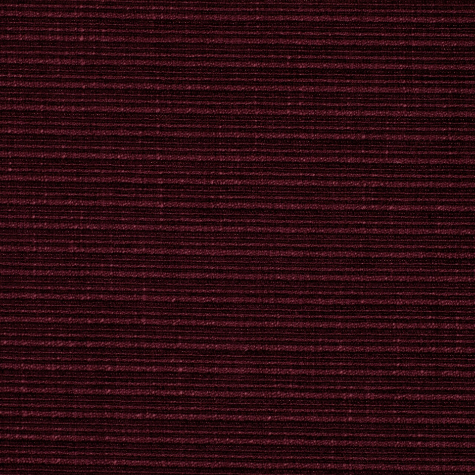 Deep burgundy corduroy-like ribbed upholstery fabric with horizontal stripes, rich texture.