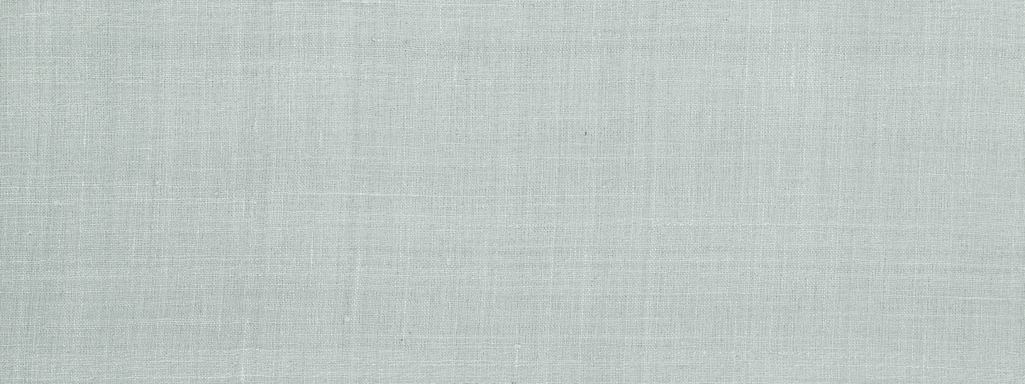 Soft pale gray linen-textured fabric background with a subtle woven pattern.