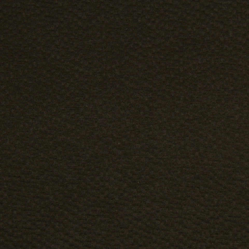 Dark brown Java upholstery fabric close-up with a subtle sheen in the weave.
