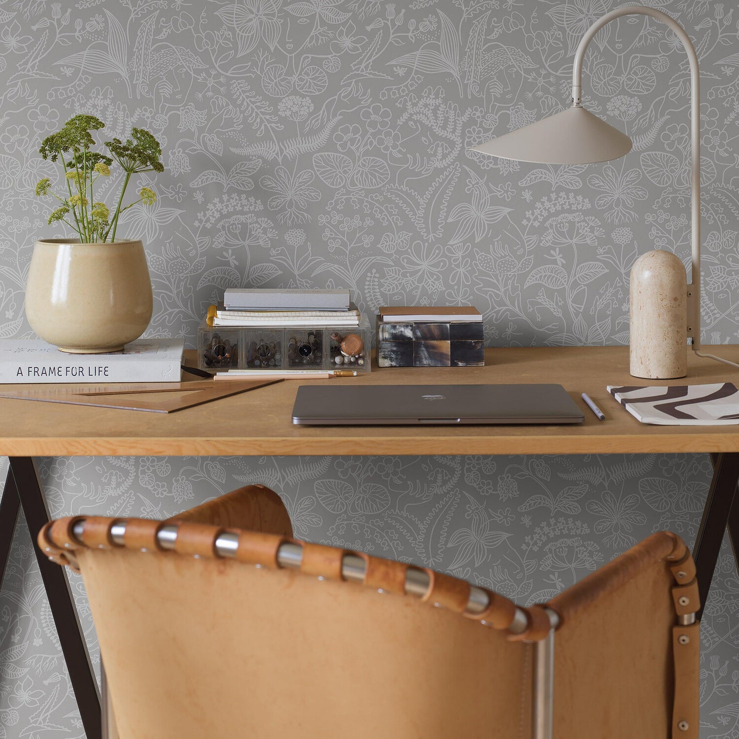Grey floral wallpaper pattern.