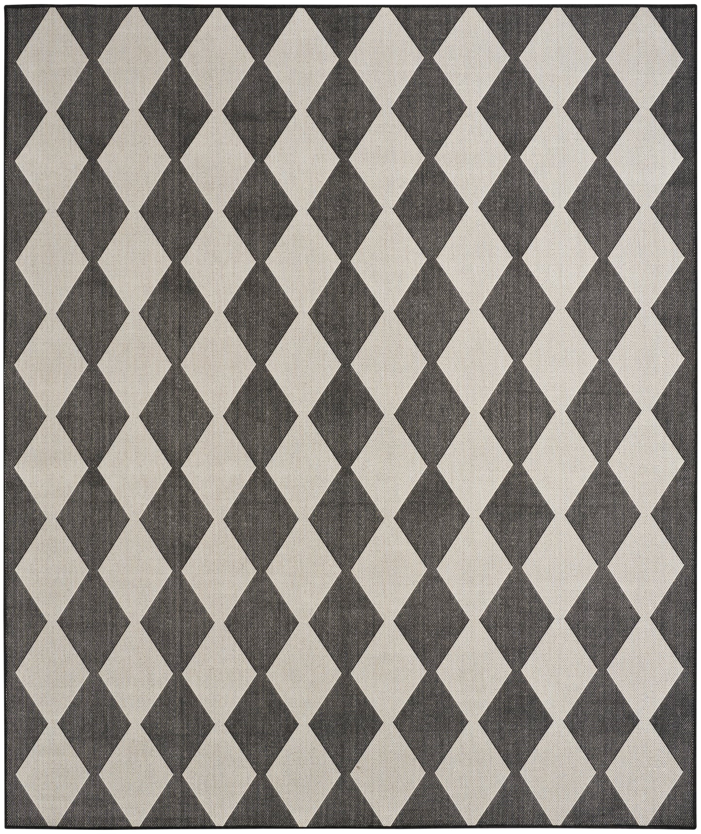 Dark gray and beige diamond argyle rug with a bordered edge.