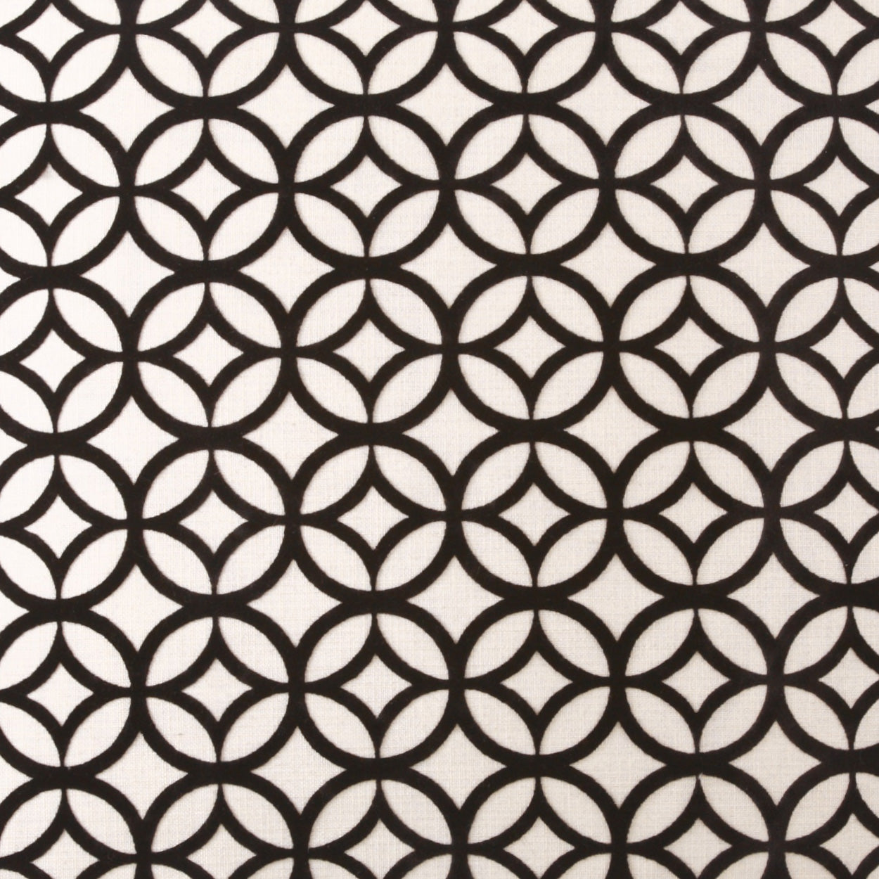 Beige fabric with dark brown interlocking circles forming a repeating lattice quatrefoil pattern.