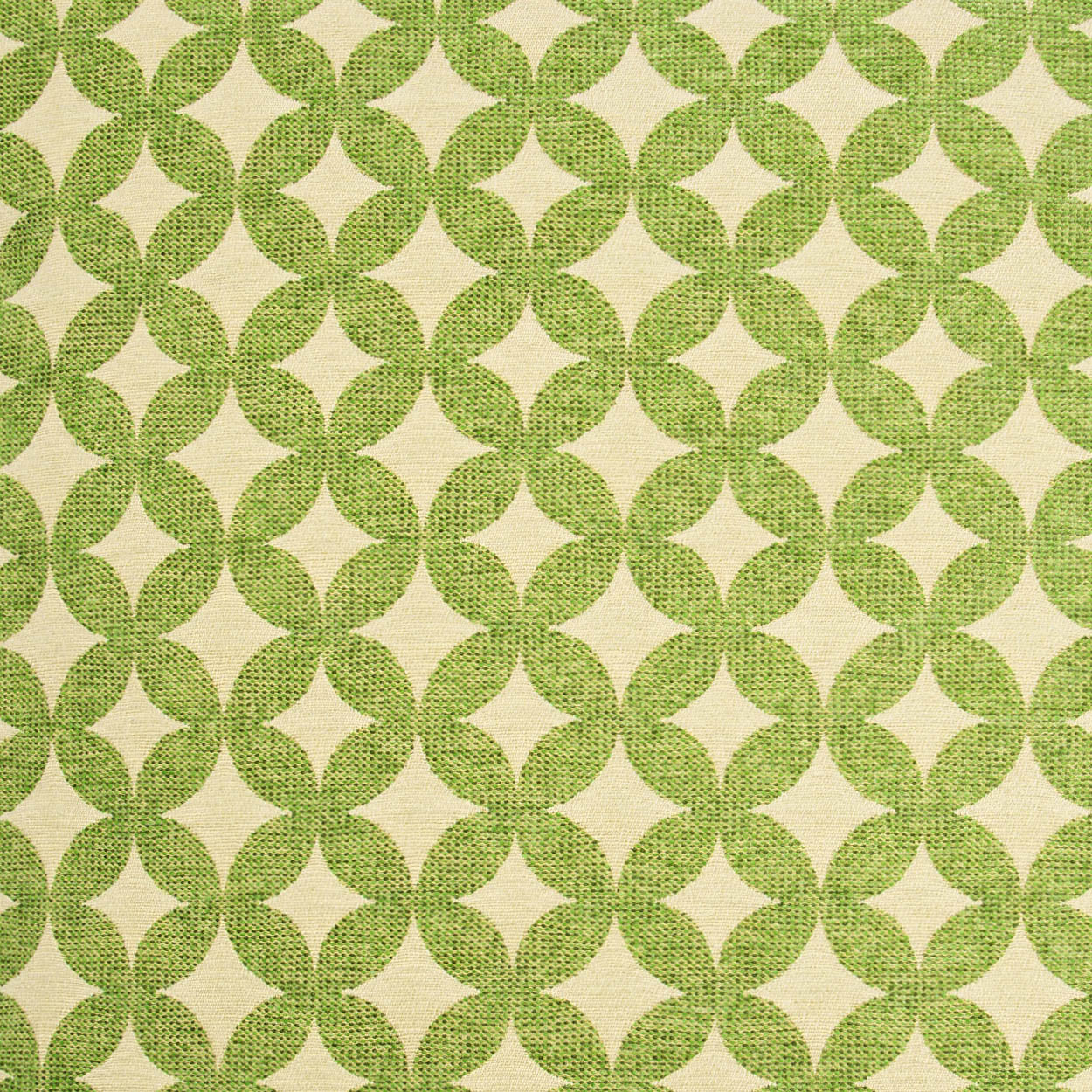 Green quatrefoil lattice pattern on beige fabric; retro upholstery textile with a woven texture.
