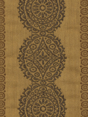 Beige upholstery fabric with a vertical row of dark brown circular mandala medallions and a detailed border; decorative tapestry style.