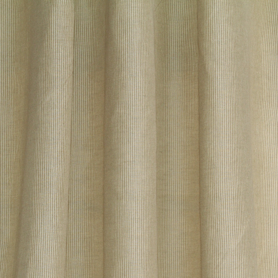Beige wheat-toned striped corduroy fabric with vertical ribs and soft drape, suitable for drapery.
