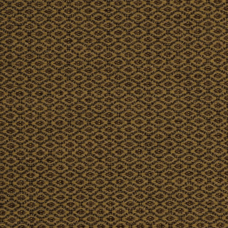 Cashew-colored woven jacquard fabric with a small repeating geometric diamond motif; warm textured upholstery material.