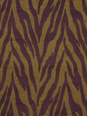 Magenta zebra-print upholstery fabric with bold, wavy animal pattern; suitable for upholstery or fashion.