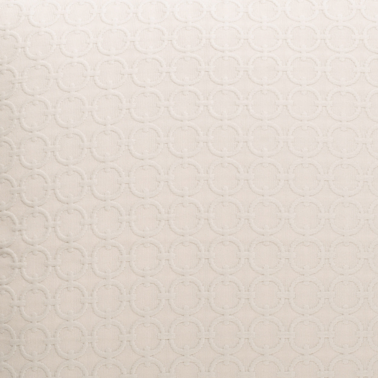 Ivory textured fabric 24" x 24" full-circle pillow with a raised interlocking circle dot pattern (jacquard-style).