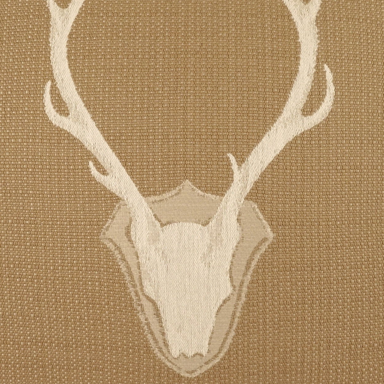 Beige woven fabric with a white deer skull and antlers motif.