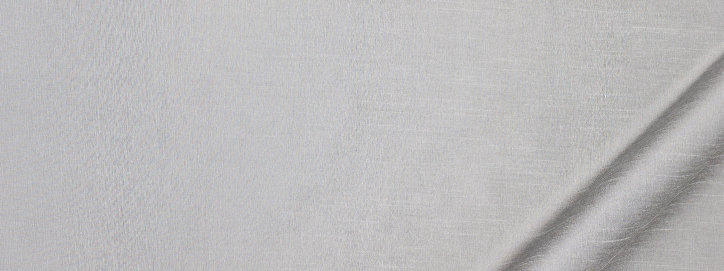 Light gray linen fabric texture with subtle weave; slight diagonal fold at bottom-right for drape and upholstery use.
