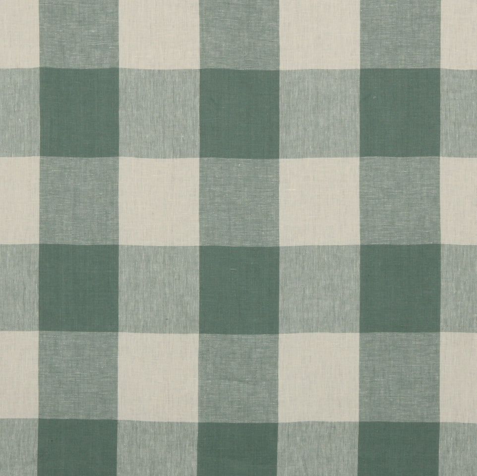 Green and cream gingham check fabric in a checkerboard pattern; cotton material for tablecloth or napkins.